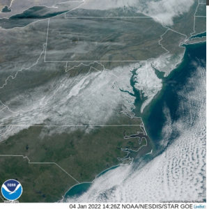 Satellite image showing snow covering a swath of the mid-atlantic.